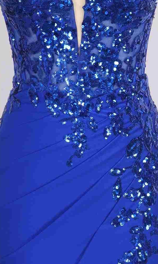 Close-up of PromGirl Exclusive 250244, a royal blue sequin long prom dress with dazzling embellishments and a deep V neckline.